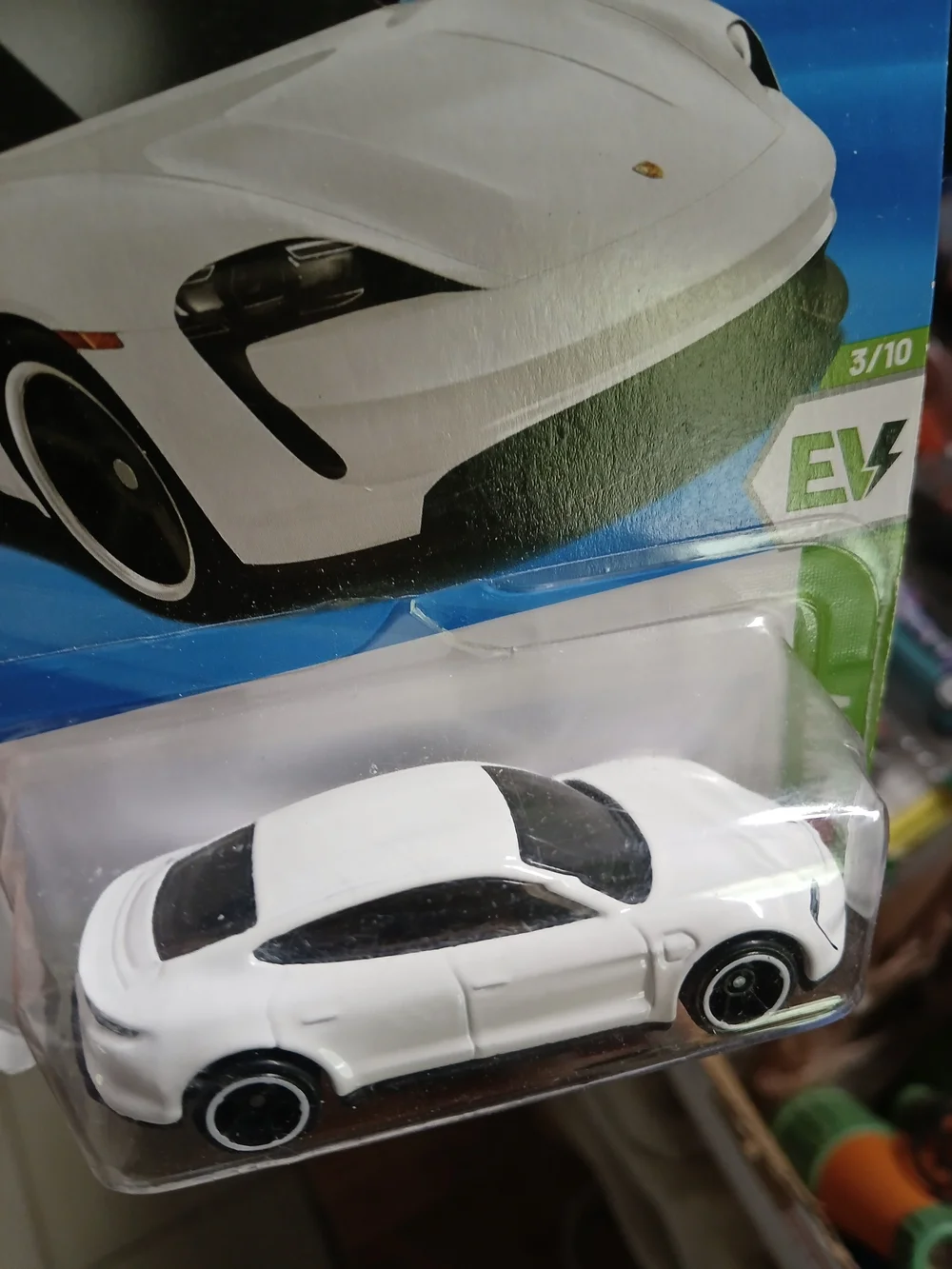 white Hot Wheels Porsche Taycan Turbo S from the 2026 HW EV series (3/10, number